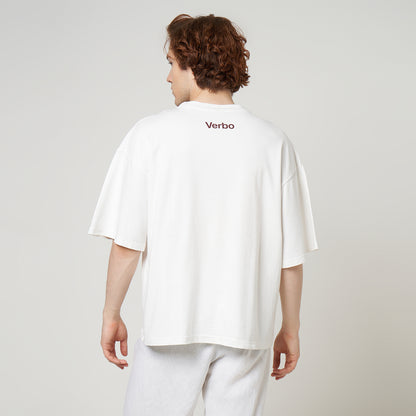 Model showcasing the wide, oversized fit and back branding of the VERBO Broken White Apple Tee.