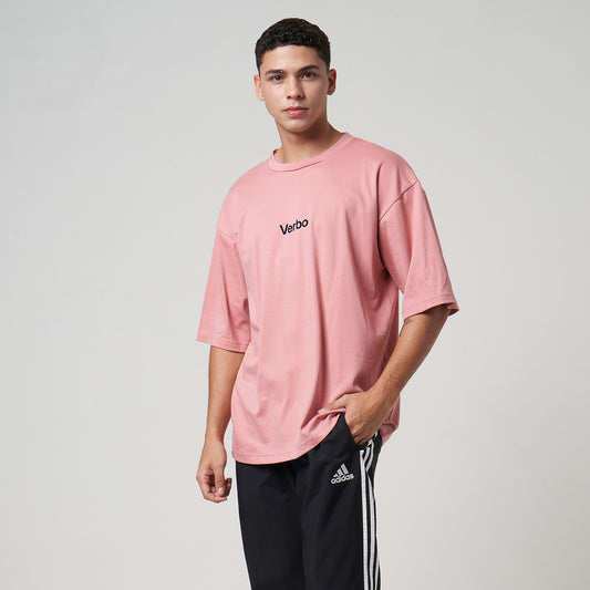 Three-quarter view of the VERBO Flocking Boxy Tee in Rose Tan, a modern streetwear-inspired pink t-shirt.