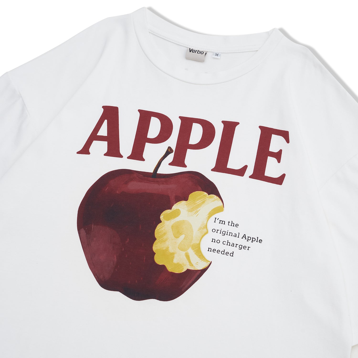 Detailed shot of the red apple print and "Original" slogan on premium Broken White heavy cotton fabric.
